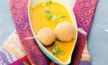 Carrot soup with spicy cheese balls